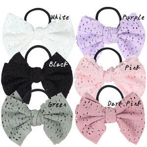 Children's hollow bow hair ties set in white, purple, black, pink, green, and dark pink