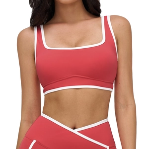 Red square neck yoga sports bra with white contrast piping and matching leggings