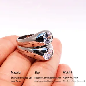Double-layer silver wide band ring with large oval cubic zirconia on finger