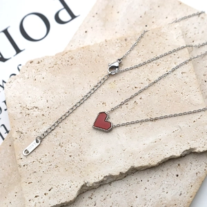 French style 18k titanium steel necklace featuring a red acrylic heart pendant on silver chain