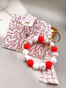 Close-up of baseball pattern PU leather card holder with matching beaded keychain bracelet