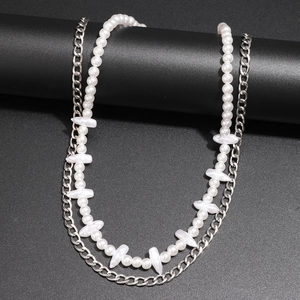 Men's double layer NK Cuban chain necklace with irregular white pearls on black display
