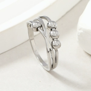 Minimalist titanium steel fidget ring with cross lines and four moving silver beads