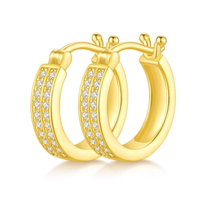 Macro view of gold plated double-row moissanite sterling silver hoop earrings