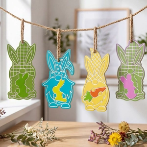 Easter gnome pendants with bunny ears and carrots hanging on twine for festive decoration