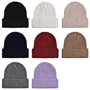 Solid knit beanies in multiple colors including black and wine red for winter warmth