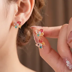Vintage gold butterfly drop earrings with colorful zircon stones and elegant fringe tassels