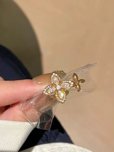 Macro shot of gold flower ring with zircon petals showing fine craftsmanship