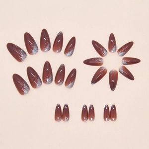 Faux ongles dégradés marron rouge rétro avec paillettes bleues et forme amande