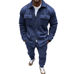 Close-up of navy blue suede tracksuit featuring lapel jacket and jogger pants for men