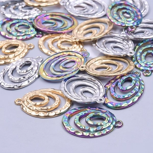 Ciondoli a spirale ovali martellati in oro, argento e arcobaleno per creazione di gioielli