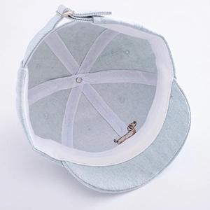 Baby light blue denim baseball cap featuring cute embroidered dog on the soft brim