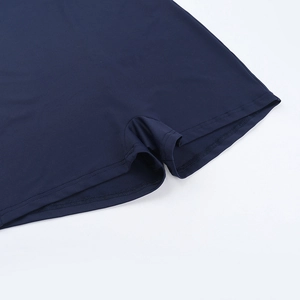 Detailed close-up of navy blue athletic shorts with durable reinforced stitching