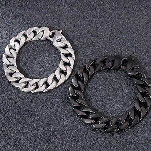 Rugged stainless steel Cuban link bracelets for men in silver and black metal finishes