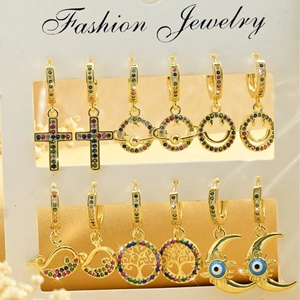 Set of 6 gold huggie hoop earrings with colorful zircon cross, star and evil eye charms