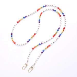 Colorful handmade seed bead crossbody strap with gold lobster clasps on white background