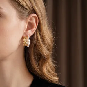 French vintage style C-shaped pearl and zircon earrings with gold lace hollow texture