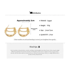 Detailed view of gold multi-layer C-shaped hoop earrings with size and weight specs