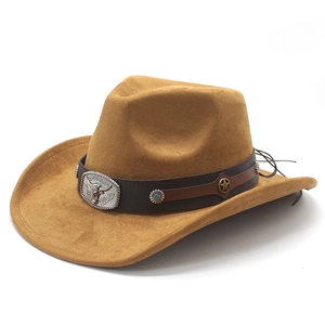 Close-up of camel faux suede cowboy hat with ornate leather band and metal bull head buckle