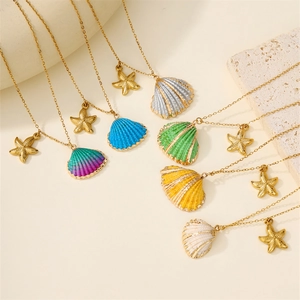 Detail of colorful shell and starfish necklaces in purple, blue, green and yellow