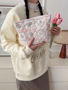 Quilted floral checkered makeup bag with pink bows and soft cotton padding for women