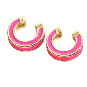 Modern gold C-shaped hoop earrings with vibrant pink enamel inlay on white background