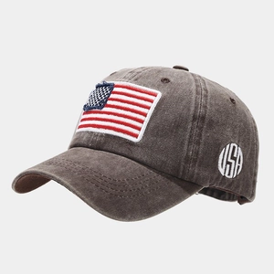 Detailed side view of washed vintage cotton baseball cap with USA circular embroidery