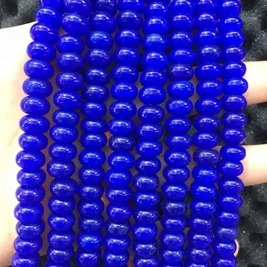 Close-up of deep blue abacus natural stone beads for DIY jewelry making and bracelets