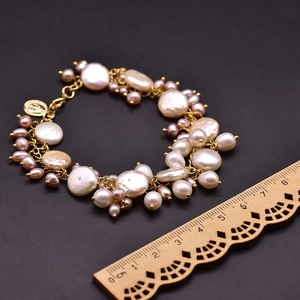 Handmade multi-layer baroque pearl bracelet with gold metal chain and vintage charms