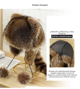 Detailed view of the warm quilted lining and long striped tail of the faux fur raccoon hat