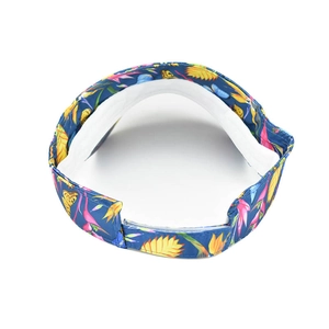 Detail view of tropical floral sun visor with adjustable velcro strap and sweatband