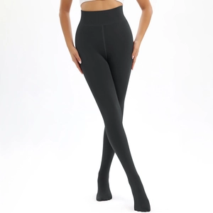 Detail of high waist control band on thick thermal black leggings for winter