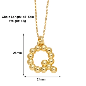 Detailed view of gold-plated letter Q pendant with 45+5cm chain length and size specs