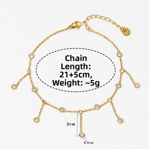Detail of gold-plated stainless steel anklet with five hanging round cubic zirconia stones