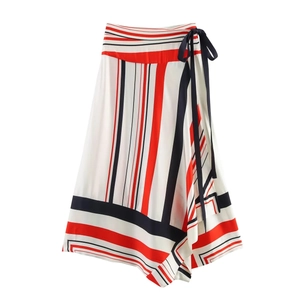 Detail of striped asymmetric wrap skirt with side tie in red white and navy