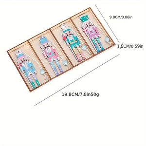 Set of four pastel nutcracker soldier wooden ornaments in a storage box with size markings