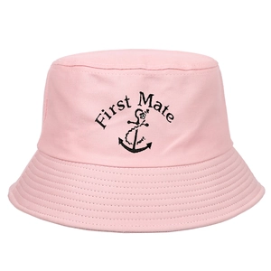 Pink canvas bucket hat with black First Mate embroidery and anchor for party events