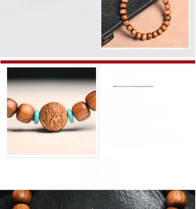 Macro shot of handcrafted natural wood prayer beads with carved cylinder and turquoise spacers