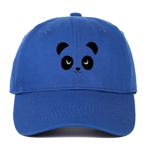 Detail of blue cotton baseball cap featuring embroidered cartoon panda face on front