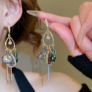 Sparkling zircon waterdrop drop earrings with bohemian multi-element fringe and gold finish