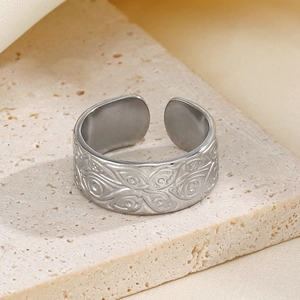 Retro stainless steel open ring with silver eye pattern engraving on stone pedestal