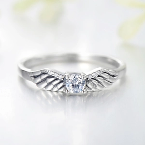 S925 sterling silver angel wing ring with round center stone and sparkling accents