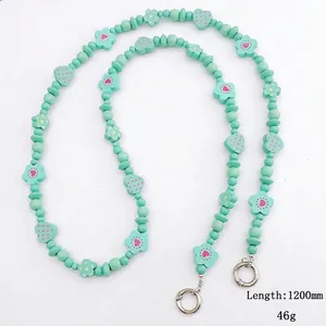 Mint green beaded phone strap with wooden flower and heart beads, length 1200mm