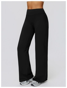 Detail of high waisted black wide leg yoga pants with elastic tummy control waistband