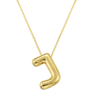 Macro shot of polished gold balloon letter J pendant on a delicate box chain necklace