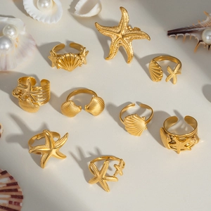 Détails de bagues dorées étoile de mer et coquillage sur perles pour vacances de plage