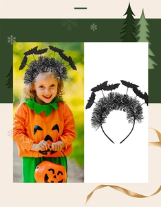 Detail of Halloween headband with black glitter bats and sparkly tinsel on a black base