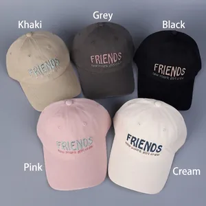 Five assorted embroidered cotton baseball caps in khaki, grey, black, pink and cream beige