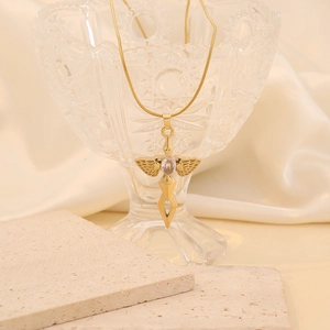 Elegant gold cross pendant necklace with angel wings and clear gemstone on snake chain
