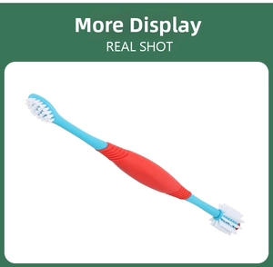 Close-up of dual-head pet toothbrush with ergonomic anti-slip handle and white bristles